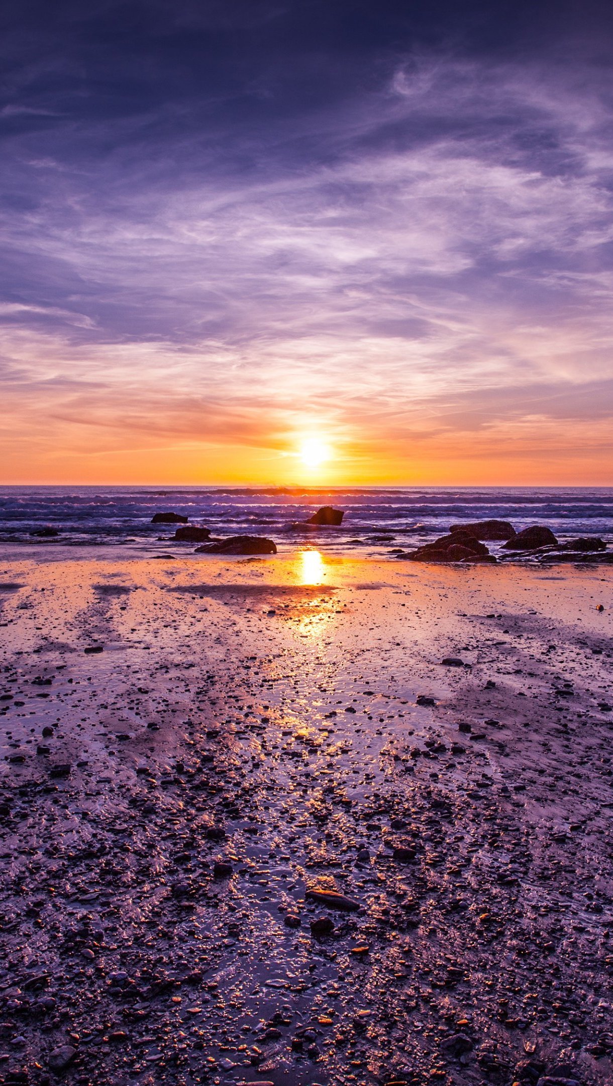 Atardecer morado desde la playa