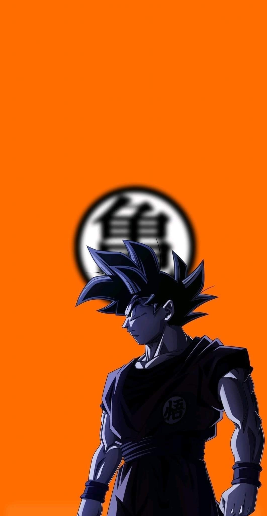 Fondo de goku con su simbolo en naranja