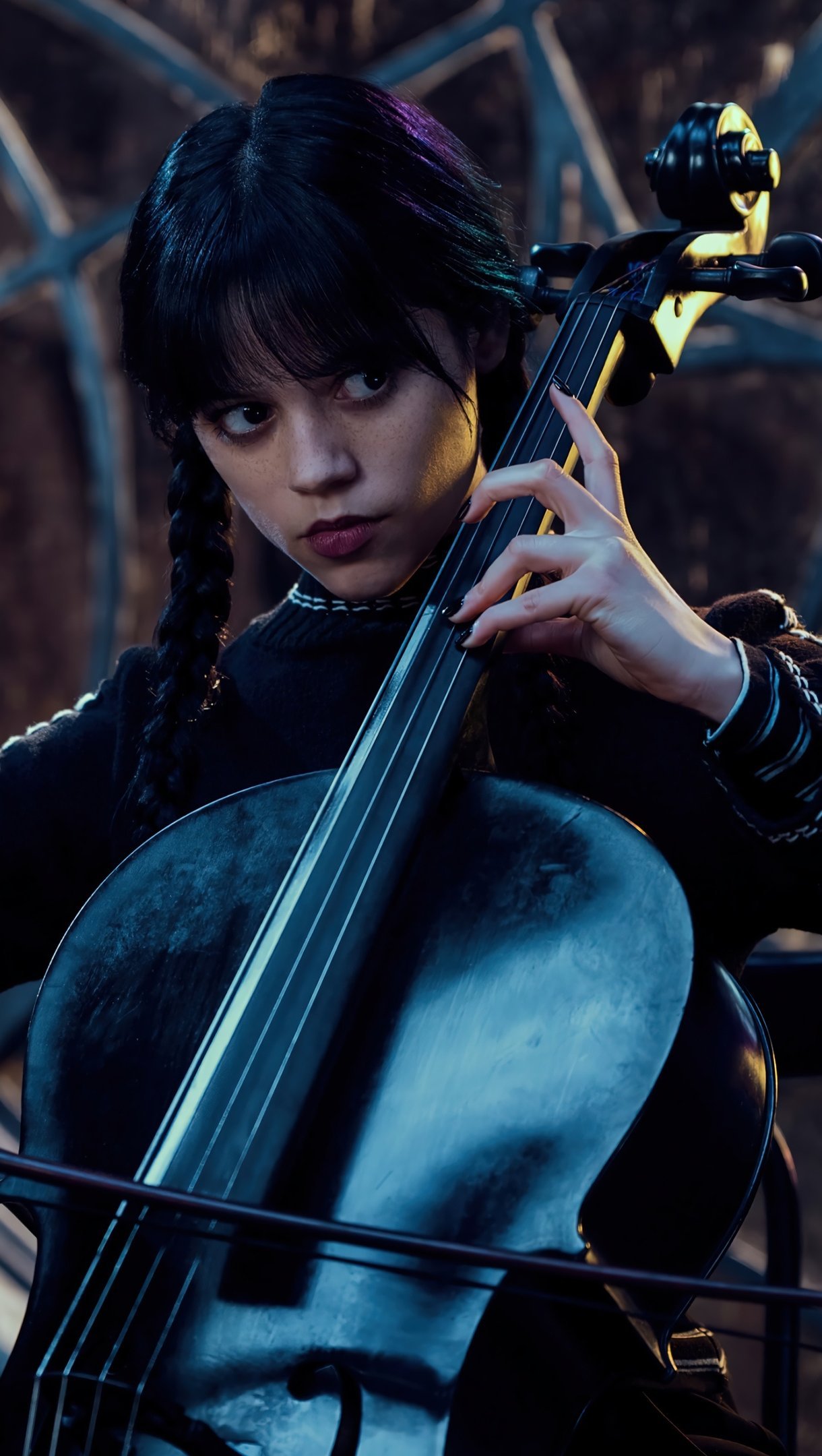 Merlina tocando el violin