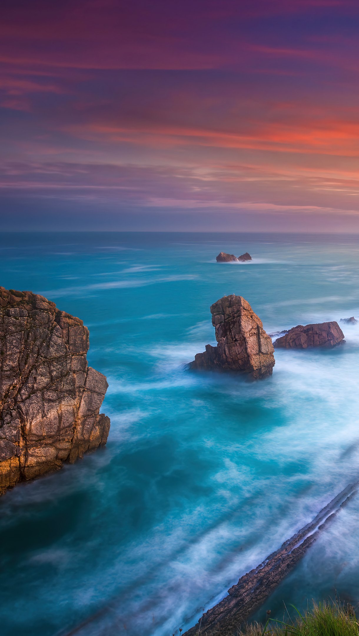 Playa de Portio en España al atardecer