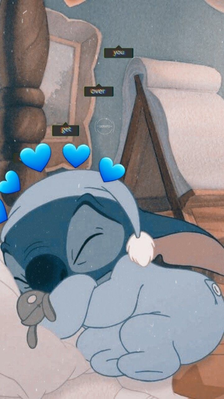 Stitch  durmiendo disfrazado de bebé