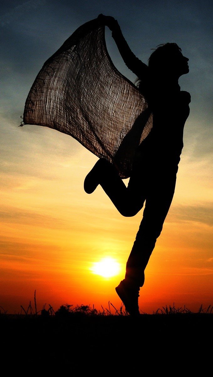 Una mujer en el atardecer